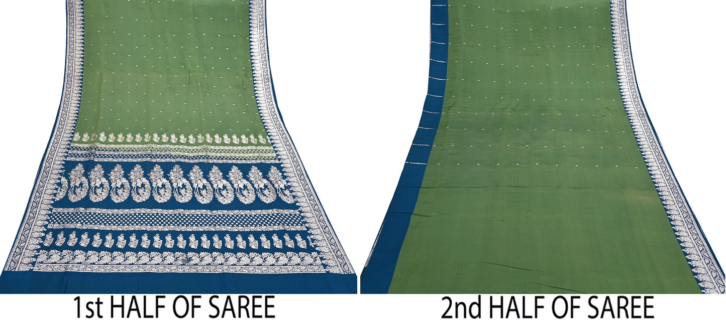 Two halves of a saree with blue and white patterns on a green background.