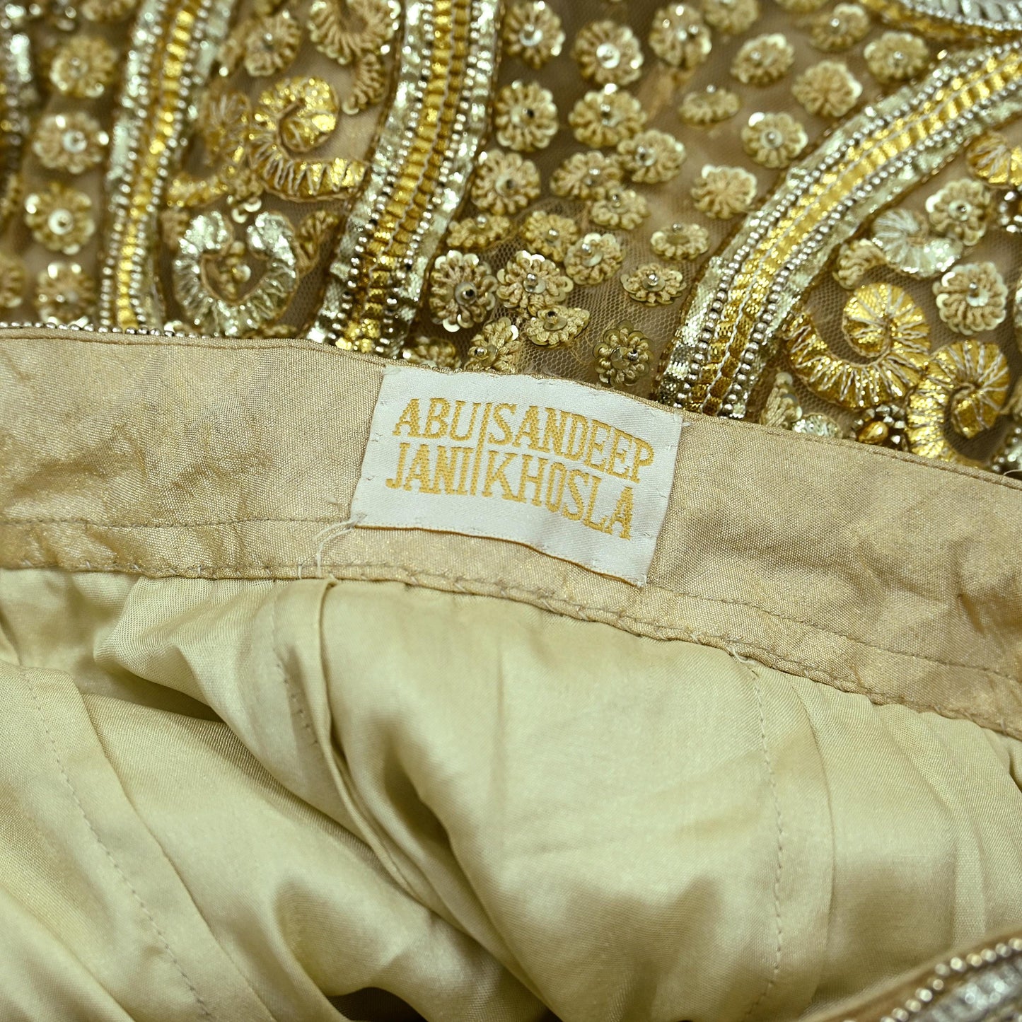 Indian Pre-owned Golden Heavy Wedding Net Hand Embroidered Lehenga/Skirt Designer By Abu Jani Bridal Wear Gota Patti