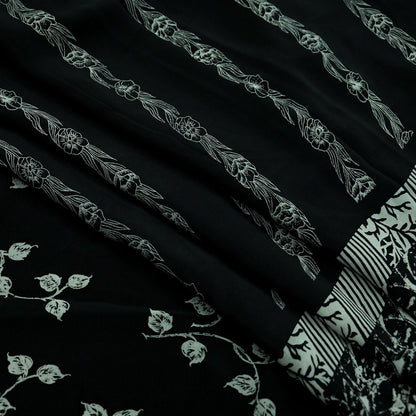 Black pure crepe silk saree fabric with white floral patterns