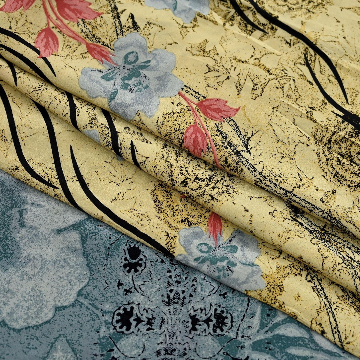 Close-up of floral-patterned silk fabric with a beige background