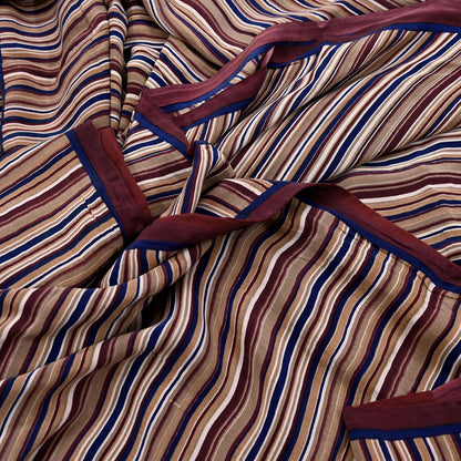 Striped fabric with brown, blue, and red colors