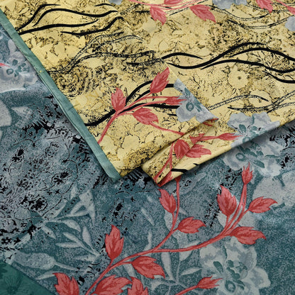 Close-up of fabric with floral patterns in yellow, red, and blue on a textured background.