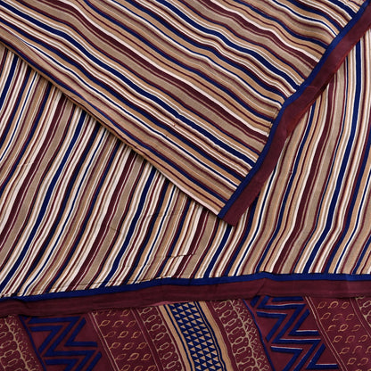 Striped fabric with a geometric pattern in brown, blue, and beige.