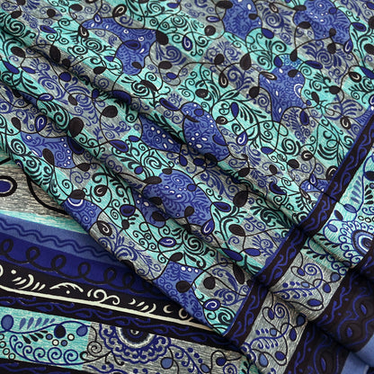 Patterned pure crepe silk saree fabric with blue and green design